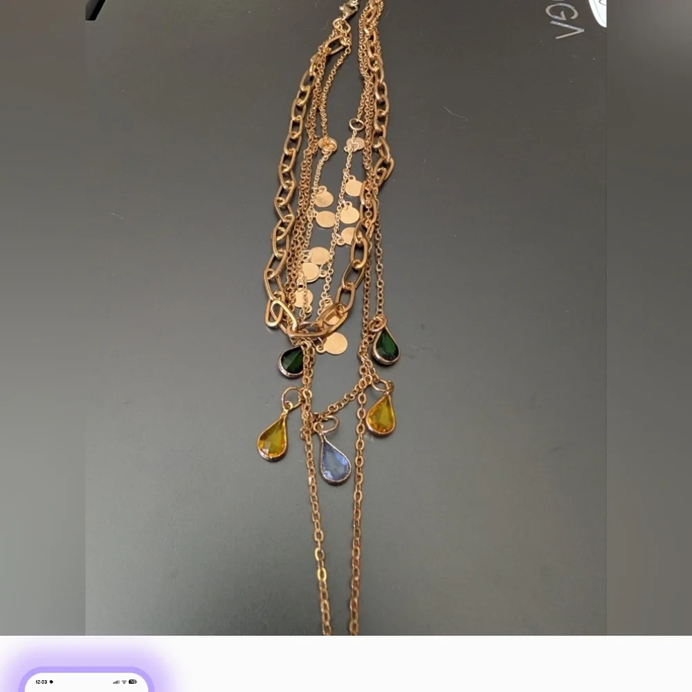 Elegant Triple-Strand Necklace in Coppery Metal with Crystal Teardrops